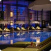 Pool area in luxury hotel at night